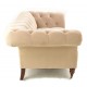 Velvet covered 2 seater chesterfield design of sofa, fabric is a light beige coloured very soft velvet 