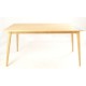 Solid wood rectangular dining table with softly rounded table legs and a plain wood finish