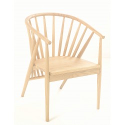Slid sungkai wood round tub chair with well spaced spindles and light wod finish