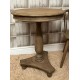 Solid wood tall occasional table with triangular base and bun feet in a stripped back dark vintage finish