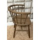 Solid wood vintage curved carver style chair with continuous arm back and finished with dark finish