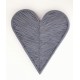Woven rattan wall art in a 3d heart shape painted in a matt grey finish