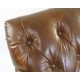 Vintage leather two seat sofa with button back and front detail solid wood feet and frame