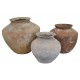 Large ceramic pot with a rustic weathered finish and wide amphora shape