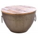 Round metal coffee table with a removable solid mango wood top in a rustic finish