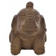 Small Dark Stone Sitting Elephant sitting on haunches with raised trunk and decorated back
