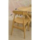 Solid wood dining chair with a oval back piece on post back and a solid seat all finished in a plain wood finish