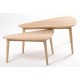 Solid wood nest of tables with 2 tables with tear drop shaped tops and simple round legs finished in a plain wood finish