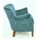 Deep Green Velvet small armchair with a solid wood frame under the soft velvet upholstery