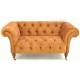 Velvet covered chesterfield design of sofa, fabric is a deep grey coloured very soft velvet