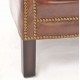 Vintage Leather professor or club chair with silver coloured studding and smooth brown leather