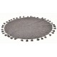Hand woven circular rug with tassels on the edge in a dark grey to black colour
