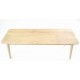 Retro style bench with simple round legs and flat seat with rounded corners