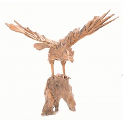 Ornamental eagle on a low stand made from reclaimed teak pieces and put together to create the eagle