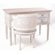 Solid wood painted desk with a delicate carved front, two drawers and finished in a shabby chic finish