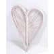 Woven rattan wall art in a 3d heart shape painted white finish